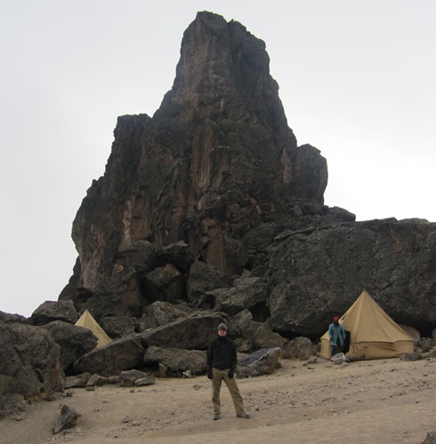Lava Tower: A huge black, red and grey block of rock.